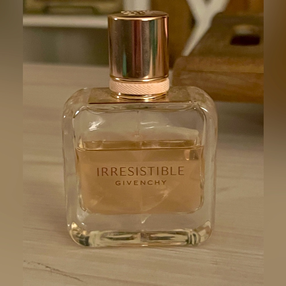 3/4 bottle of Irresistible GIVENCHY 1.1 oz